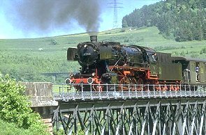 steam railway crossing a bridge in the Black Forest